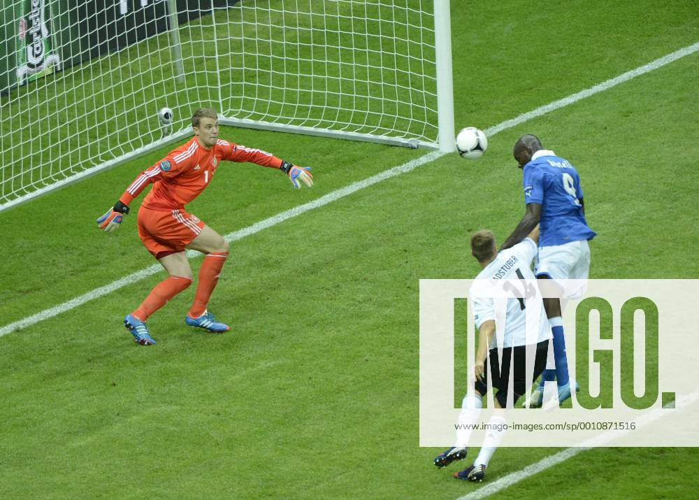 -- Mario Balotelli (R) of Italy scores against Manuel Neuer and Holger Badstuber during the semifinal match between Germany and Italy at the Euro 2012 football championships in Warsaw, Poland, June 28, 2012. (Xinhua Wu Wei) (jyc) POLAND-WARSAW-EURO 2012 FOOTBALL CHAMPIONSHIPS-SEMIFINAL-GERMANY VS ITALY