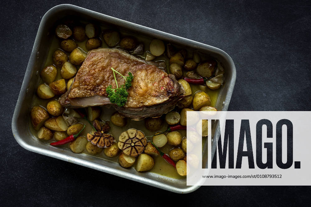 From Above a roast lamb with potatoes