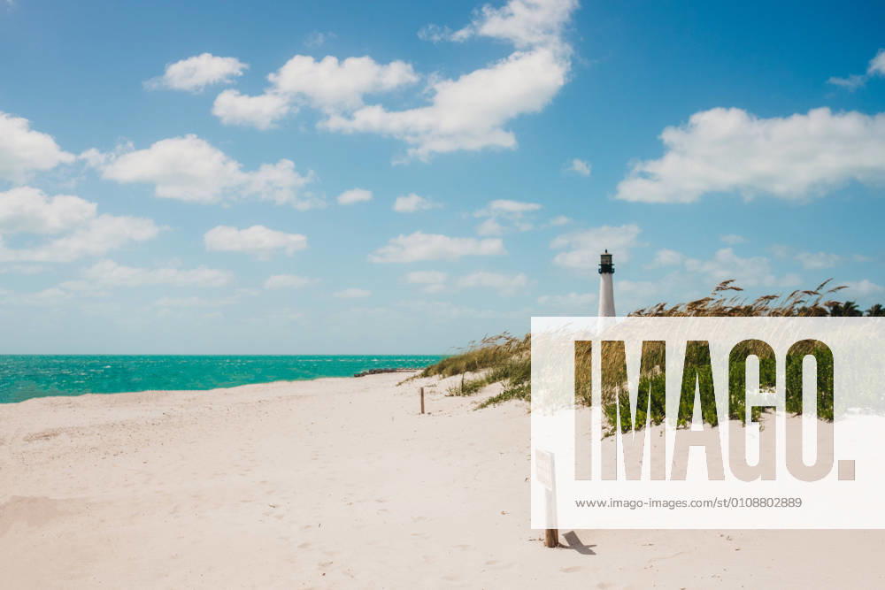 Lighthouse standing on beach