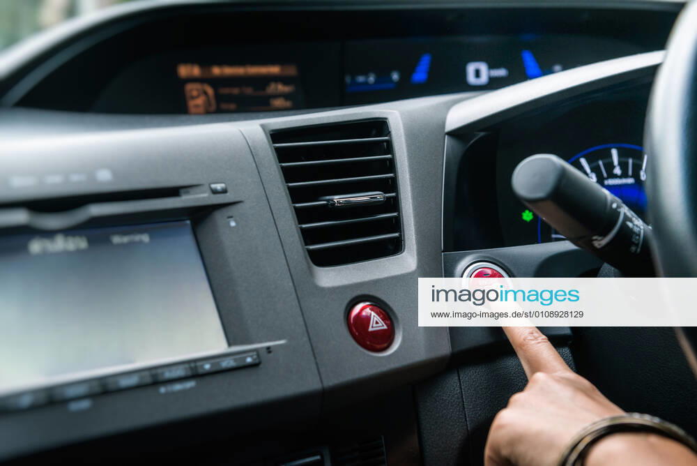 Pictures of the beginning Pictures of the beginning of the journey by car,Focus on fingerfinger, hand, button, symbol, starter, air, within, car, black, press, travel, destination, Automatic, energy, Oil, drive, conveniently, easy, safe, finance, auto, automobile, automotive, computer, control, direction, driver, modern, part, route, screen, system, technology, transport, vehicle, business, engine, ignition, interior, object, plastic, power, push, sign, start, stop, switch, dashboard, insurance, safety,