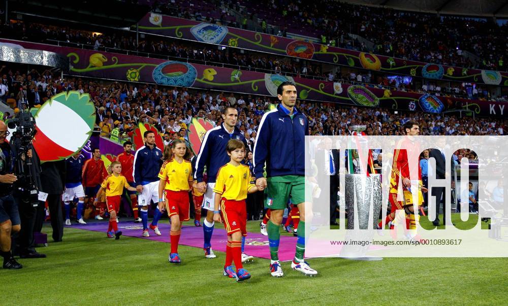 Gianluigi Buffon of Italy and Iker Casillas of Spain lead their teams onto the field..Euro 2012 Final, Spain v Italy at the Olympic Stadium, Kiev, Ukraine on the 1st July 2012. Pic Jake Badger SPORTIMAGE... .