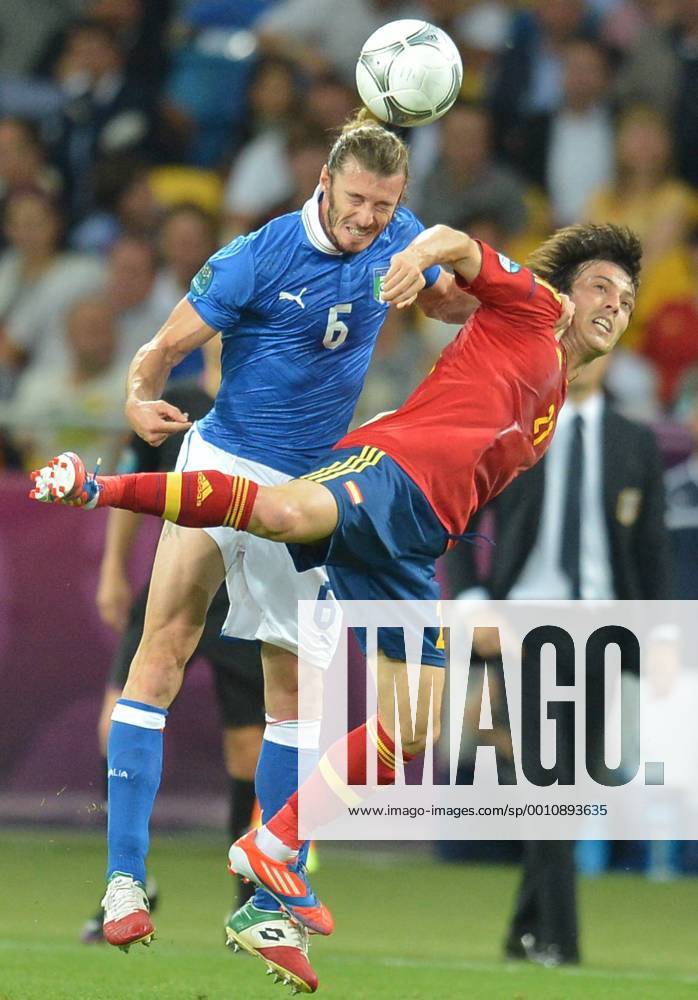 David Silva (R) of Spain vies with Federico Balzaretti of Italy during the final match between Italy and Spain at the Euro 2012 football championships in Kiev, Ukraine, July 1, 2012. (Xinhua Li Yong) (jyc) UKRAINE-KIEV-EURO 2012 FOOTBALL CHAMPIONSHIPS-FINAL