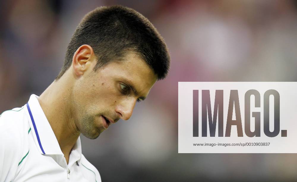 -- Novak Djokovic of Serbia reacts during the fourth round match of men s singles at the Wimbledon Championships 2012 in London, Britain on July 2, 2012.