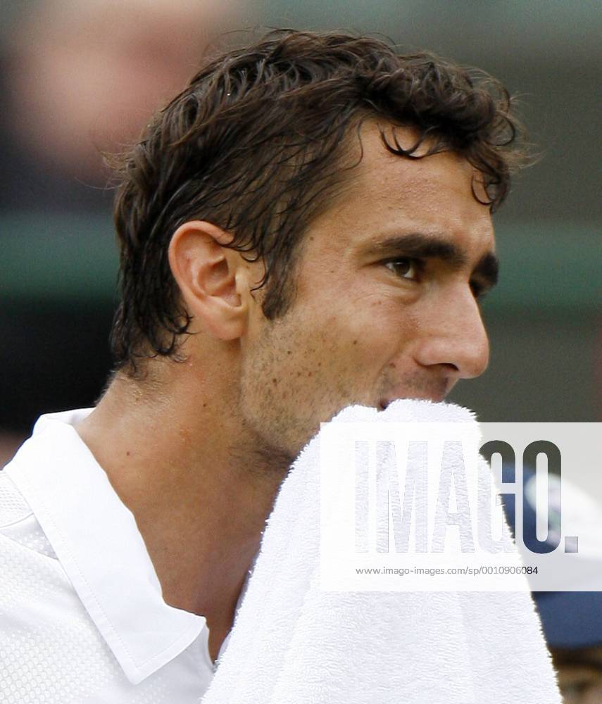 -- Marin Cilic of Croatia reacts during the fourth round match of men s singles at the Wimbledon Championships 2012 in London, Britain on July 3, 2012.
