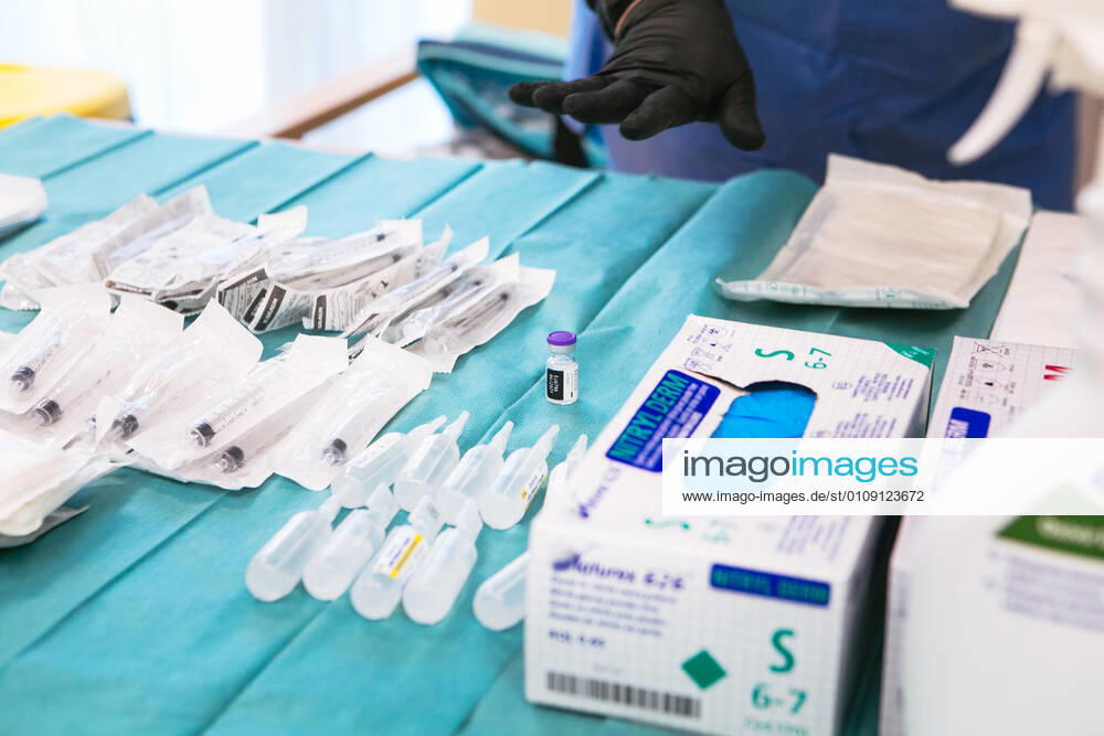 Vials and needles to administer the first dose of the Pfizer and BioNTech vaccine, on the first day of vaccination against Covid-19 in Spain, in the Rosalba de MÃ rida nursing home in Extremadura (Spain), on 27 December 2020. The first doses of the vaccine developed by Pfizer and BioNtech laboratories arrived in Spain yesterday, December 26th, at a Pfizer warehouse in Guadalajara by land from Puurs (Belgium). Starting Monday, weekly deliveries will be made to the autonomous communities with an average of 350,000 doses prioritized for four population groups: residents and health and social-health personnel in homes for the elderly and disabled; front-line health personnel; other health and social-health personnel and large non-institutionali