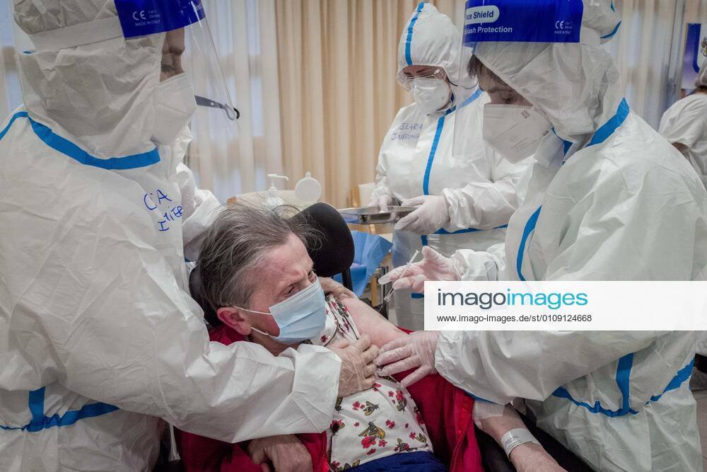 Milan. First doses of Pfizer Biontech anti COVID19 vaccine, administered to the first elderly people subject to greater risks and medical staff at PAT Pio Albergo Trivulzio Editorial Usage Only