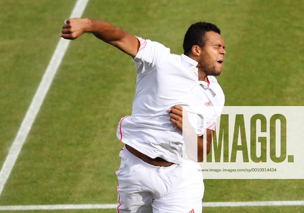 Jo-Wilfried Tsonga of France jubilates after the quarterfinal of men s singles at the Wimbledon Championships 2012 in London -