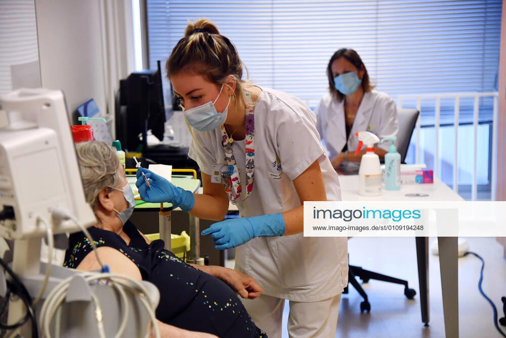 (201228) -- LILLE (FRANCE), Dec. 28, 2020 -- A woman receives a dose of COVID-19 vaccine in Lille, France, on Dec. 28, 2020. France started the vaccination campaign on Sunday. The French government has planned a gradual roll-out plan to invite citizens, on a voluntary basis and free of charge, to receive COVID-19 vaccine. ( Handout via Xinhua) FRANCE-LILLE-COVID-19-VACCINATION CAMPAIGN StephanexMortagne CHUxdexLille
