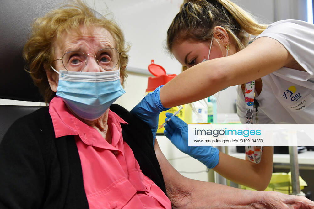 (201228) -- LILLE (FRANCE), Dec. 28, 2020 -- A woman receives a dose of COVID-19 vaccine in Lille, France, on Dec. 28, 2020. France started the vaccination campaign on Sunday. The French government has planned a gradual roll-out plan to invite citizens, on a voluntary basis and free of charge, to receive COVID-19 vaccine. ( Handout via Xinhua) FRANCE-LILLE-COVID-19-VACCINATION CAMPAIGN StephanexMortagne CHUxdexLille