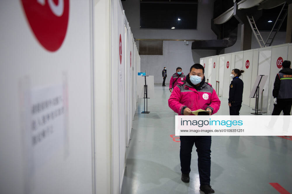 (210102) -- BEIJING, Jan. 2, 2021 -- People wait for receiving COVID-19 vaccines at a temporary vaccination site in Beijing, capital of China, Jan. 2, 2021. Beijing started administering COVID-19 vaccines among specific groups of people with higher infection risks. Nine groups of people aged 18 to 59 will receive the vaccine before the Spring Festival of 2021, which falls on Feb. 12. These include frontline customs inspectors of imported cold-chain goods and personnel working in the overseas and domestic transportation sector. ) CHINA-BEIJING-COVID-19-VACCINATION (CN) ChenxZhonghao