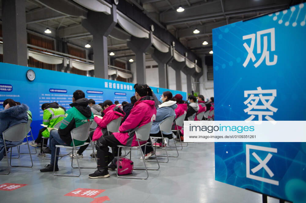 (210102) -- BEIJING, Jan. 2, 2021 -- People sit for 30 minutes of observation after receiving COVID-19 vaccines at a temporary vaccination site in Beijing, capital of China, Jan. 2, 2021. Beijing started administering COVID-19 vaccines among specific groups of people with higher infection risks. Nine groups of people aged 18 to 59 will receive the vaccine before the Spring Festival of 2021, which falls on Feb. 12. These include frontline customs inspectors of imported cold-chain goods and personnel working in the overseas and domestic transportation sector. ) CHINA-BEIJING-COVID-19-VACCINATION (CN) ChenxZhonghao
