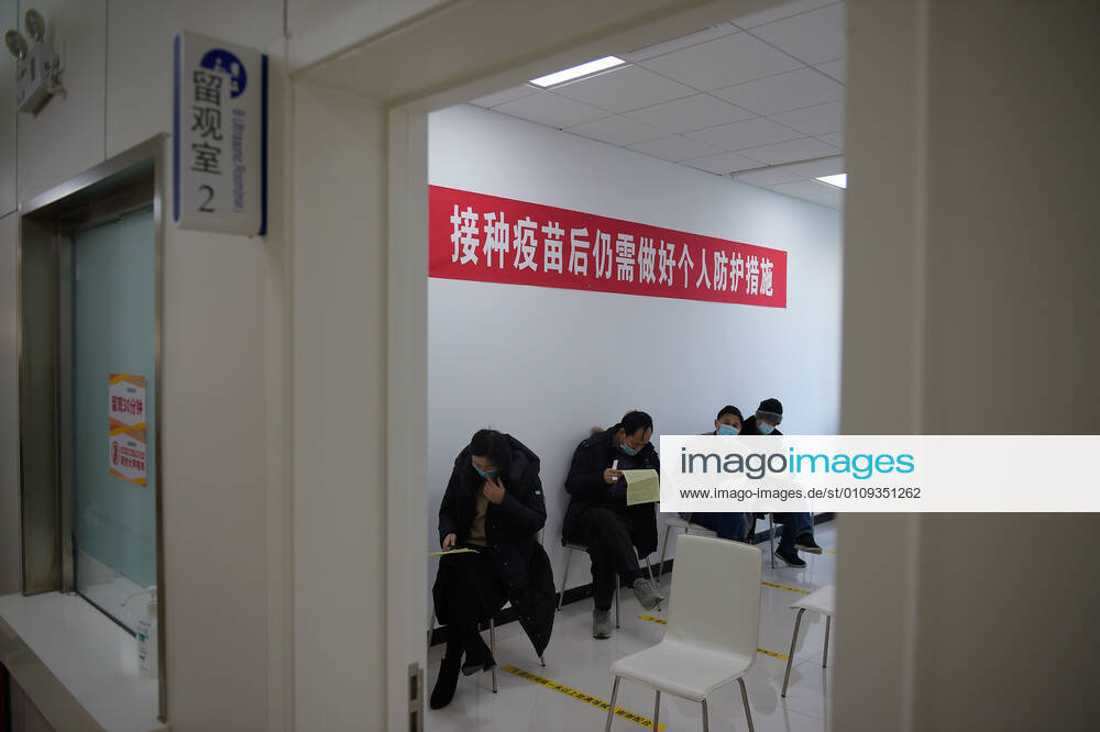 (210102) -- BEIJING, Jan. 2, 2021 -- People sit for 30 minutes of observation after receiving COVID-19 vaccines at a healthcare center in Beijing, capital of China, Jan. 2, 2021. Beijing started administering COVID-19 vaccines among specific groups of people with higher infection risks. Nine groups of people aged 18 to 59 will receive the vaccine before the Spring Festival of 2021, which falls on Feb. 12. These include frontline customs inspectors of imported cold-chain goods and personnel working in the overseas and domestic transportation sector. ) CHINA-BEIJING-COVID-19-VACCINATION (CN) PengxZiyang