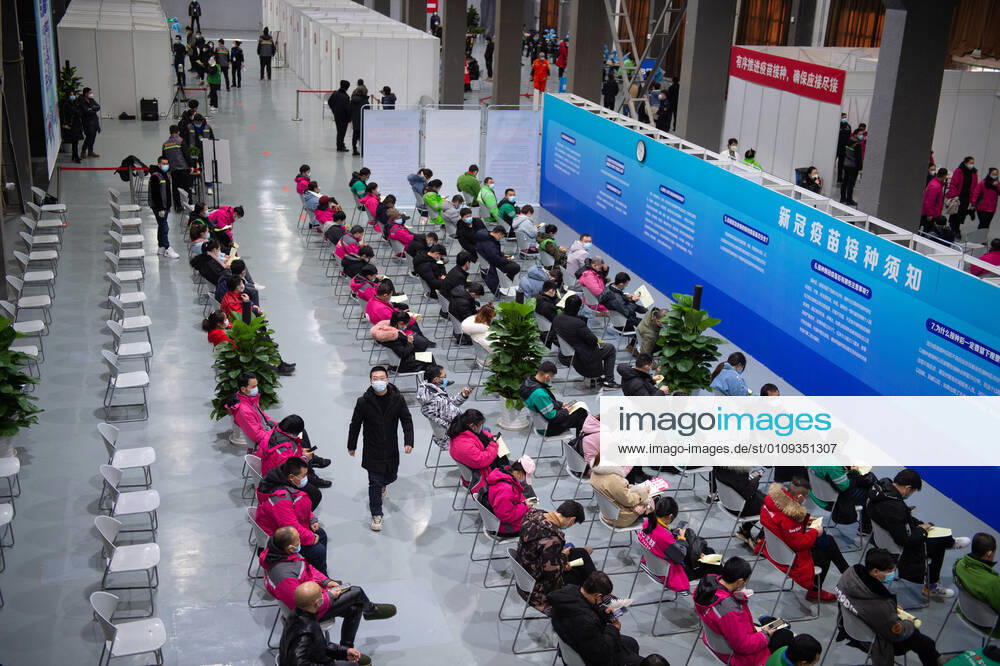 (210102) -- BEIJING, Jan. 2, 2021 -- People sit for 30 minutes of observation after receiving COVID-19 vaccines at a temporary vaccination site in Beijing, capital of China, Jan. 2, 2021. Beijing started administering COVID-19 vaccines among specific groups of people with higher infection risks. Nine groups of people aged 18 to 59 will receive the vaccine before the Spring Festival of 2021, which falls on Feb. 12. These include frontline customs inspectors of imported cold-chain goods and personnel working in the overseas and domestic transportation sector. ) CHINA-BEIJING-COVID-19-VACCINATION (CN) ChenxZhonghao