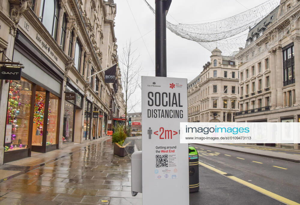 A social distancing sign seen on an empty and deserted Regent street in London..The government has issued a stay at home order as the third national lockdown takes hold in England. London United Kingdom - ZUMAs197 20210105_zaa_s197_073