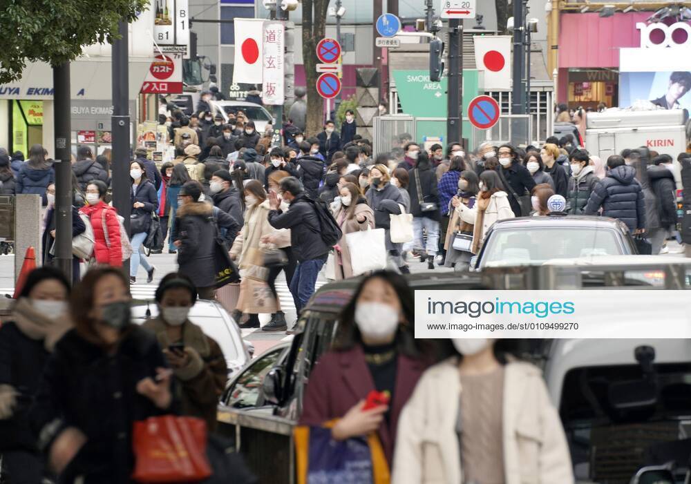 Explosive virus infections in Tokyo People wearing face masks walk in Tokyo s Shibuya area on Jan. 6, 2021, as the capital s daily coronavirus infections reached a record 1,591 cases the same day.