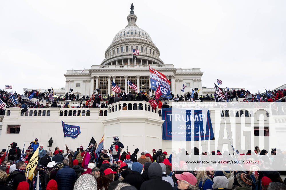 January 6, 2021 - Washington, DC, United States: Protesters at a Pro Trump protest, shown here on the west side of the U.S. Capitol Washington United States - ZUMAb161 20210106_zap_b161_015