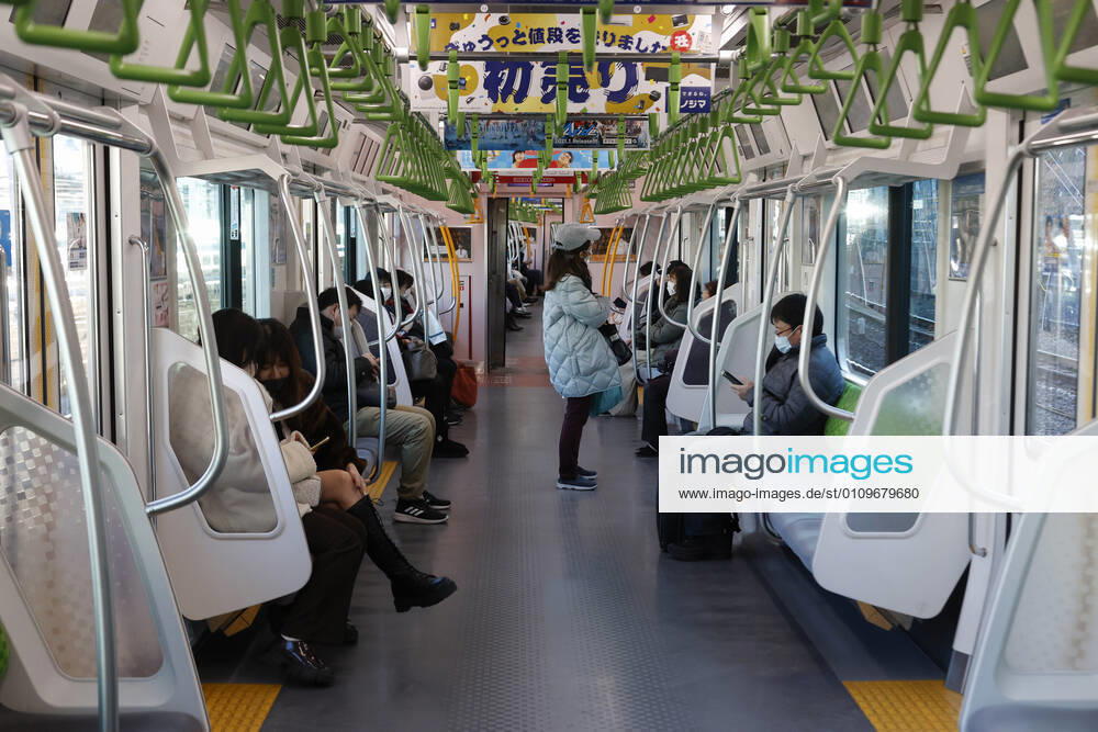 Fewer passenger than normal are seen inside a train during the first Sunday after the second state of emergency was declared in the capital. Tokyo reported 1,494 new COVID-19 cases on January 10; following four days of over 2,000 cases, the daily infections count dropped for the first time after the state of emergency was declared in Tokyo, Kanagawa, Saitama, and Chiba prefectures. Tokyo Japan - ZUMAm191 20210110_zap_m191_009