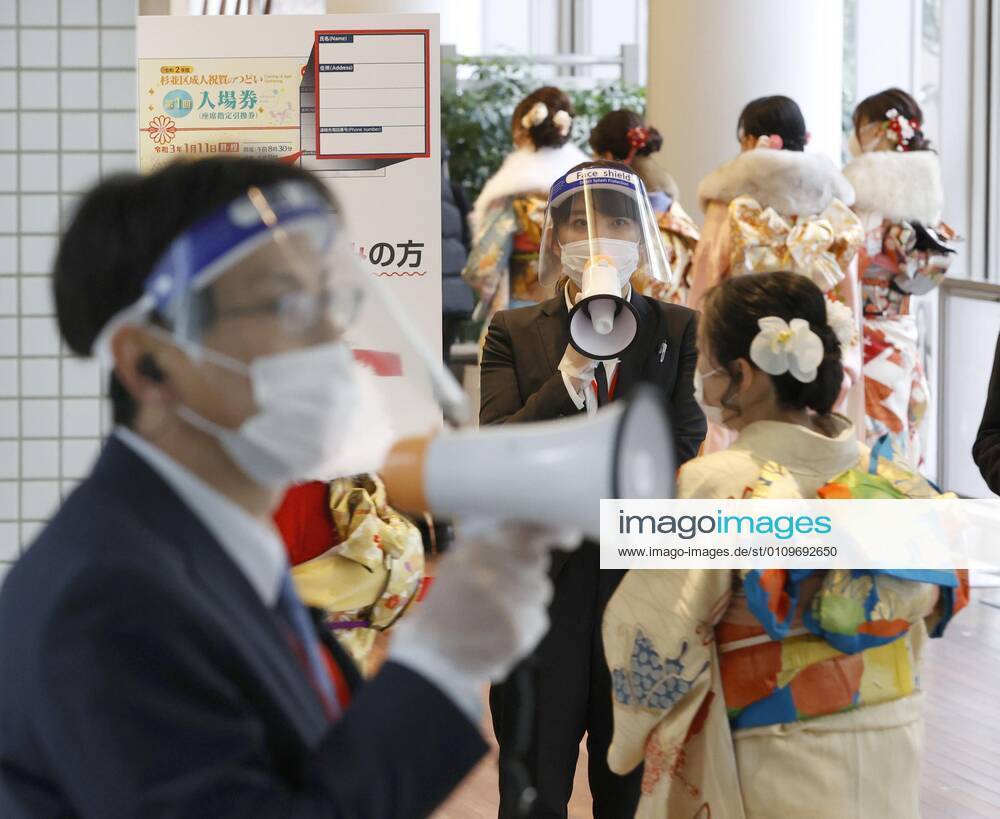 Coming-of-age ceremony under virus state of emergency Women clad in kimono enter the venue of a coming-of-age ceremony in Tokyo s Suginami Ward on Jan. 11, 2021, wearing face masks as the capital is under a coronavirus state of emergency.
