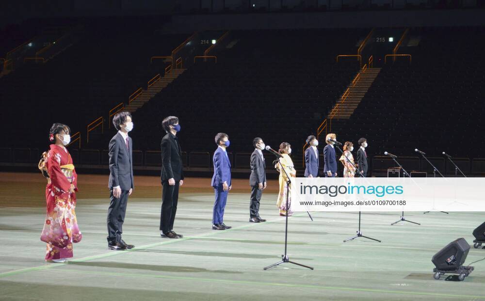 Coming-of-Age ceremony under virus state of emergency Photo taken on Jan. 11, 2021, shows 10 people attending a coming-of-age ceremony at Saitama Super Arena near Tokyo, broadcast online for other people in the city who would have attended it without the coronavirus pandemic. The 10 people organized the ceremony, held at a time when the Tokyo metropolitan area is under a virus state of emergency.