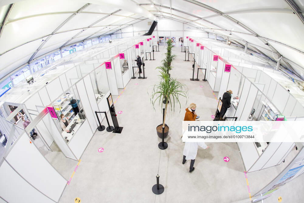 ASSEN A healthcare worker is being tested for and vaccinated against the coronavirus in the large test and vaccination location at the TT Circuit De GGD s Joint Health Services in Amsterdam, Drenthe and The Hague have started vaccinating healthcare personnel ANP VINCENT JANNINK