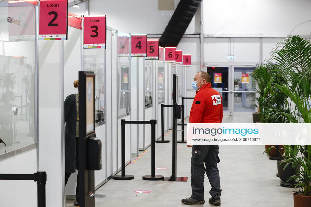 ASSEN An employee of the Red Cross in the large test and vaccination location at the TT Circuit De GGD s Common Health Services in Amsterdam, Drenthe and The Hague started vaccinating health personnel ANP VINCENT JANNINK