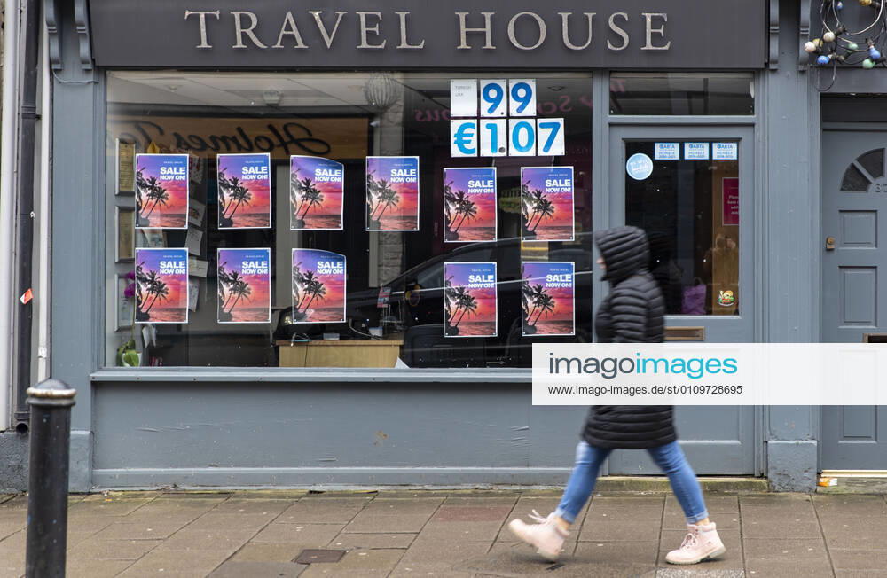 A pedestrian walks past the Travel House in Wales. Newport United Kingdom - ZUMAs197 20210111_zab_s197_010