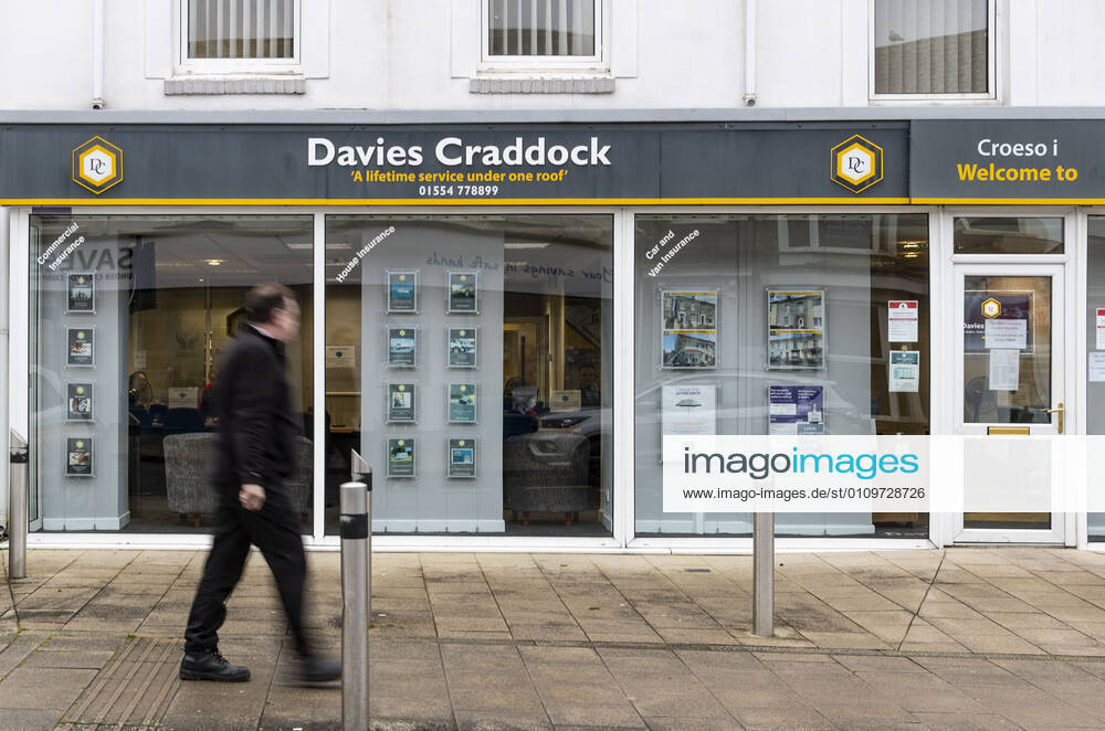 A man walks past Davies Craddock property agent in Wales. Newport United Kingdom - ZUMAs197 20210111_zab_s197_022