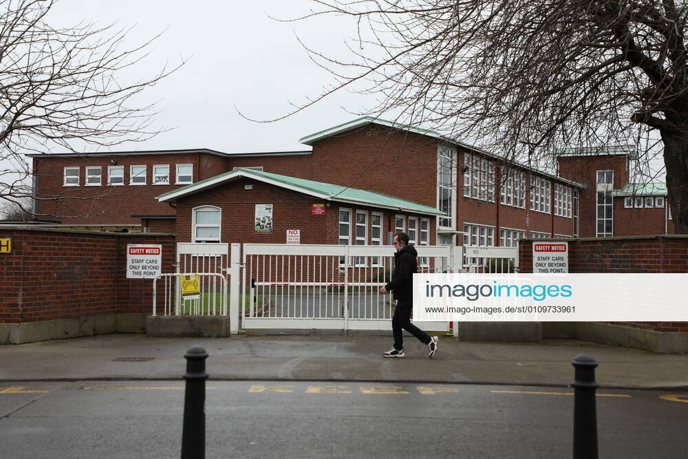 (210112) -- DUBLIN, Jan. 12, 2021 () -- A pedestrian walks past a school which has been closed amid the COVID-19 pandemic in Dublin, Ireland, Jan. 11, 2021. Due to the worsening COVID-19 situation in Ireland, all the schools in the country, which are supposed to be opened on Monday, have been asked to remain closed until Feb. 1, according to a decision announced by the Irish government. () IRELAND-COVID-19-SCHOOLS-CLOSURE Xinhua