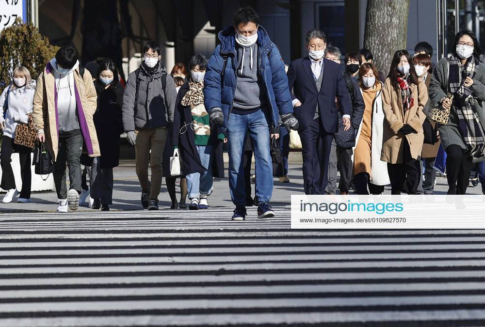 Suga to expand virus emergency to 7 more prefectures People wearing masks walk in Nagoya, Aichi Prefecture, on Jan. 13, 2021. Japanese Prime Minister Yoshihide Suga is set to declare a state of emergency in seven additional prefectures including Aichi later in the day amid a resurgence of coronavirus infections across Japan.