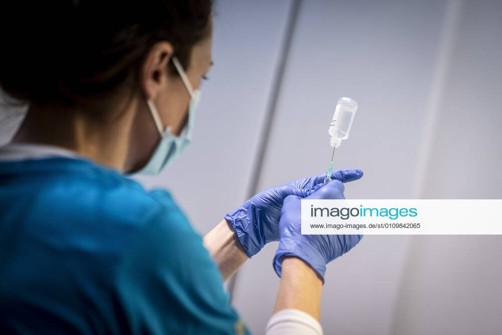 Sprays are pulled up and prepared in connection with the opening of the first vaccine center in the Capital Region of Denmark in OEksnehallen, at Halmtorvet in Copenhagen, Wednesday 13 January 2021, Copenhagen Denmark