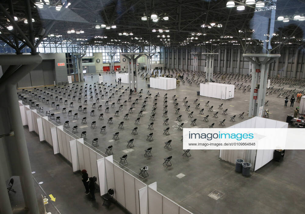 Empty chairs serve as a recovery area for patients who have just received the COVID-19 vaccination at the Jacob K. Javits Convention Center in New York City on Wednesday, January 13, 2021. The Javits Convention Center which served as a massive field hospital last spring when New York City was the epicenter of the pandemic, now will serve as a huge vaccine distribution center. NYP20210113110 JohnxAngelillo
