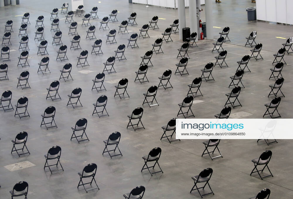 Empty chairs serve as a recovery area for patients who have just received the COVID-19 vaccination at the Jacob K. Javits Convention Center in New York City on Wednesday, January 13, 2021. The Javits Convention Center which served as a massive field hospital last spring when New York City was the epicenter of the pandemic, now will serve as a huge vaccine distribution center. NYP20210113111 JohnxAngelillo