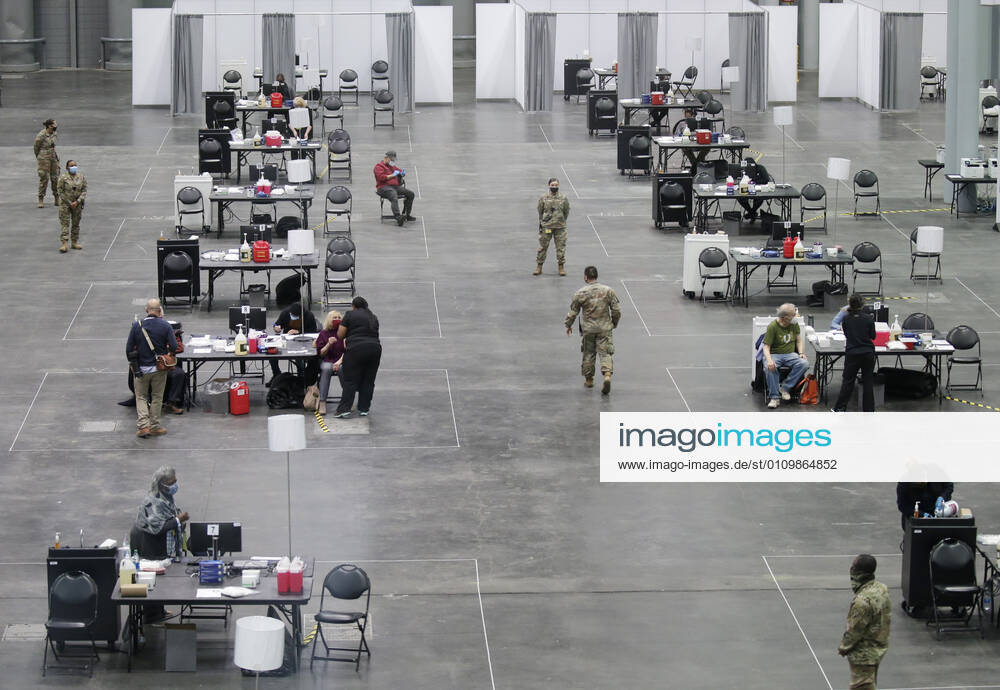 Tables and chairs are set up to deliver a COVID-19 vaccination to patients at the Jacob K. Javits Convention Center in New York City on Wednesday, January 13, 2021. The Javits Convention Center which served as a massive field hospital last spring when New York City was the epicenter of the pandemic, now will serve as a huge vaccine distribution center. NYP20210113116 JohnxAngelillo