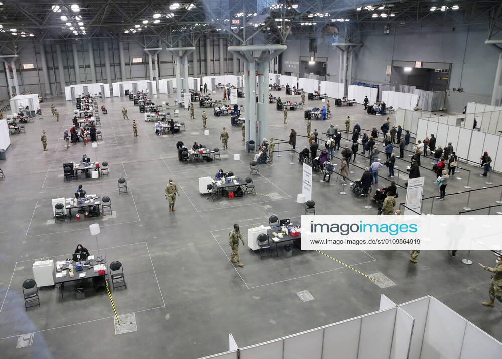 Tables and chairs are set up to deliver a COVID-19 vaccination to patients at the Jacob K. Javits Convention Center in New York City on Wednesday, January 13, 2021. The Javits Convention Center which served as a massive field hospital last spring when New York City was the epicenter of the pandemic, now will serve as a huge vaccine distribution center. NYP20210113117 JohnxAngelillo