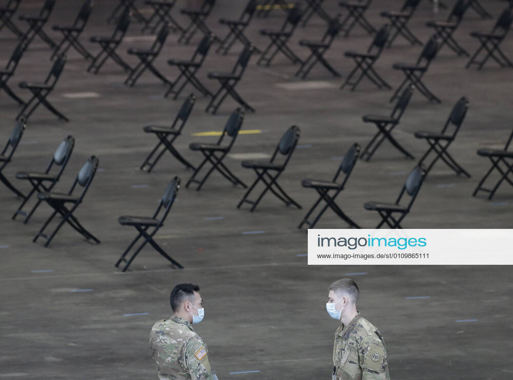 Empty chairs serve as a recovery area for patients who have just received the COVID-19 vaccination at the Jacob K. Javits Convention Center in New York City on Wednesday, January 13, 2021. The Javits Convention Center which served as a massive field hospital last spring when New York City was the epicenter of the pandemic, now will serve as a huge vaccine distribution center. NYP20210113102 JohnxAngelillo