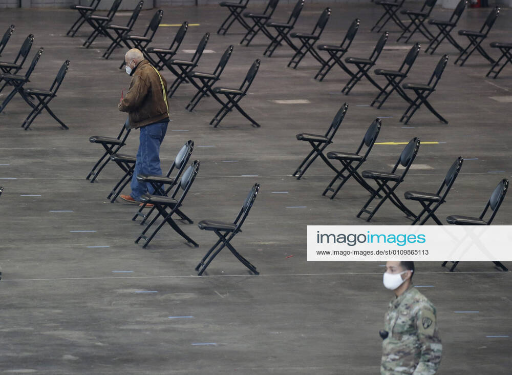 Empty chairs serve as a recovery area for patients who have just received the COVID-19 vaccination at the Jacob K. Javits Convention Center in New York City on Wednesday, January 13, 2021. The Javits Convention Center which served as a massive field hospital last spring when New York City was the epicenter of the pandemic, now will serve as a huge vaccine distribution center. NYP20210113103 JohnxAngelillo