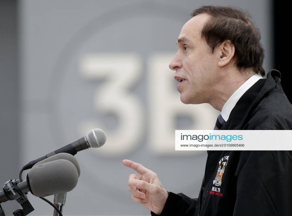 DOH Commissioner Howard Zucker speaks as patients arrive and go through the check in process to received a COVID-19 vaccination at the Jacob K. Javits Convention Center in New York City on Wednesday, January 13, 2021. The Javits Convention Center which served as a massive field hospital last spring when New York City was the epicenter of the pandemic, now will serve as a huge vaccine distribution center. NYP20210113108 JohnxAngelillo
