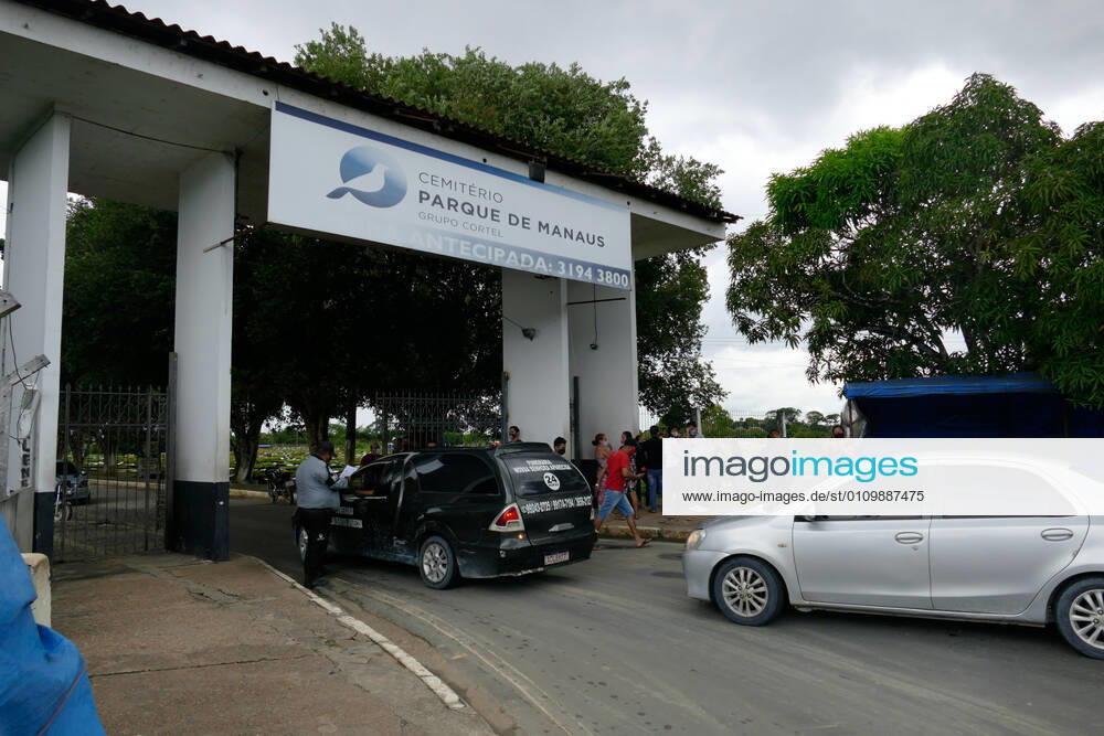 MANAUS, AM - 13.01.2021: ENTERROS DE COVID EM NOVO LOCAL EM MANAUS - Burials of people who died because of Covid-19, this Wednesday afternoon (13th), at the Nossa Senhora Aparecida cemetery in Manaus (AM). In the photo, a funeral car at the entrance to the cemetery gate. x2017265x SandroxPereira