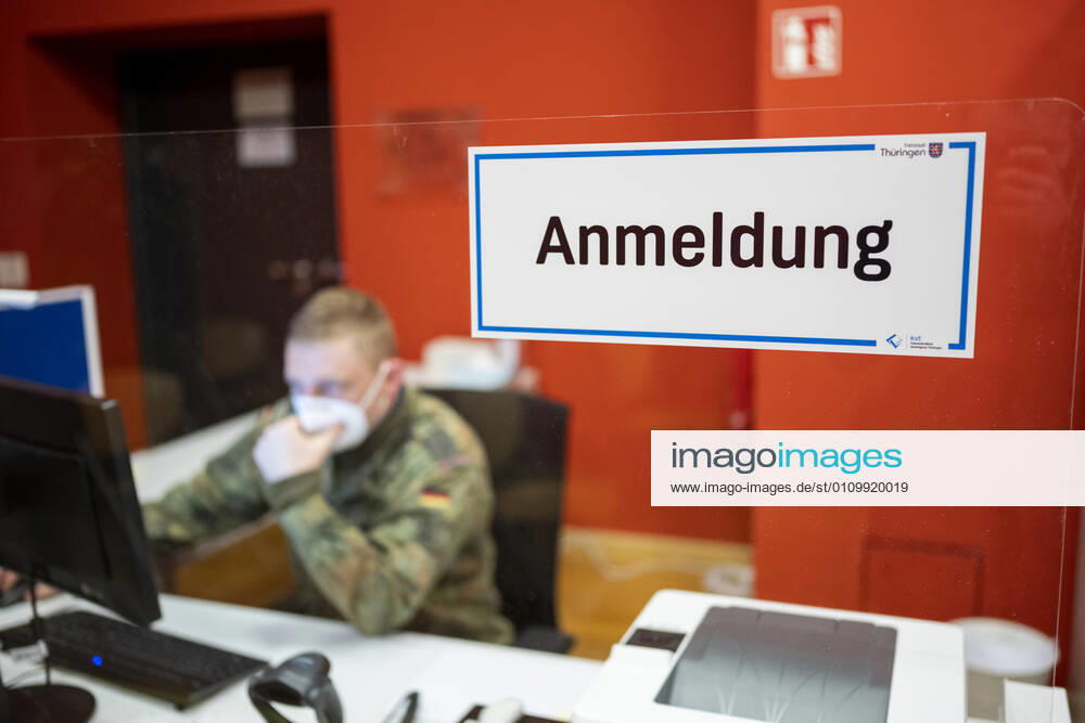 COVID 19 VACCINATION CENTER IN WEIMAR OPENS 13 01 2021 Weimar Soldiers of the German Armed Forces help with registration at the mon ami in Weimar, Thuringia, on 13 January 2021 The Free State of Thuringia started anti-COVID 19 vaccinations at vaccination centers on 13 January 2021