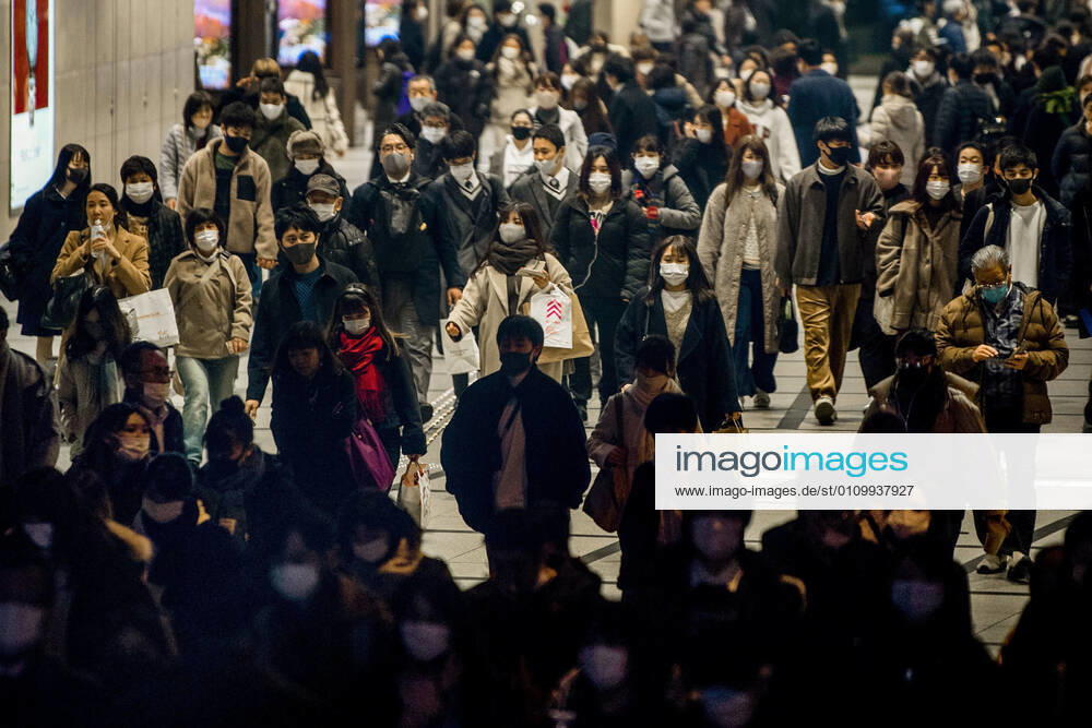Day after Japan expands coronavirus emergency to 7 more prefectures People wearing face masks walk in Osaka s Umeda area on Jan. 14, 2021, a day after Japanese Prime Minister Yoshihide Suga declared a state of emergency in seven additional prefectures, including Osaka, amid the continued spread of the novel coronavirus.