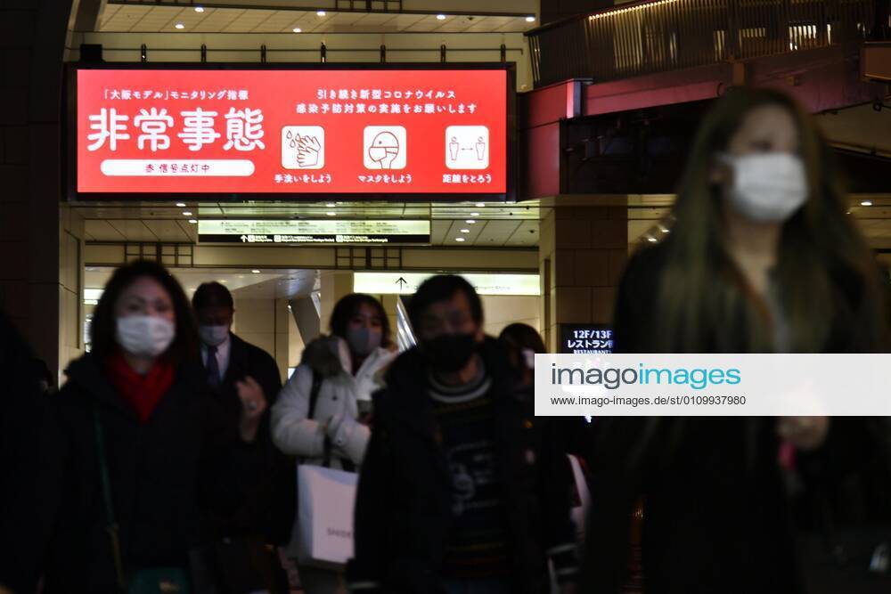 Day after Japan expands coronavirus emergency to 7 more prefectures People wearing face masks walk in Osaka s Umeda area on Jan. 14, 2021, a day after Japanese Prime Minister Yoshihide Suga declared a state of emergency in seven additional prefectures, including Osaka, amid the continued spread of the novel coronavirus.