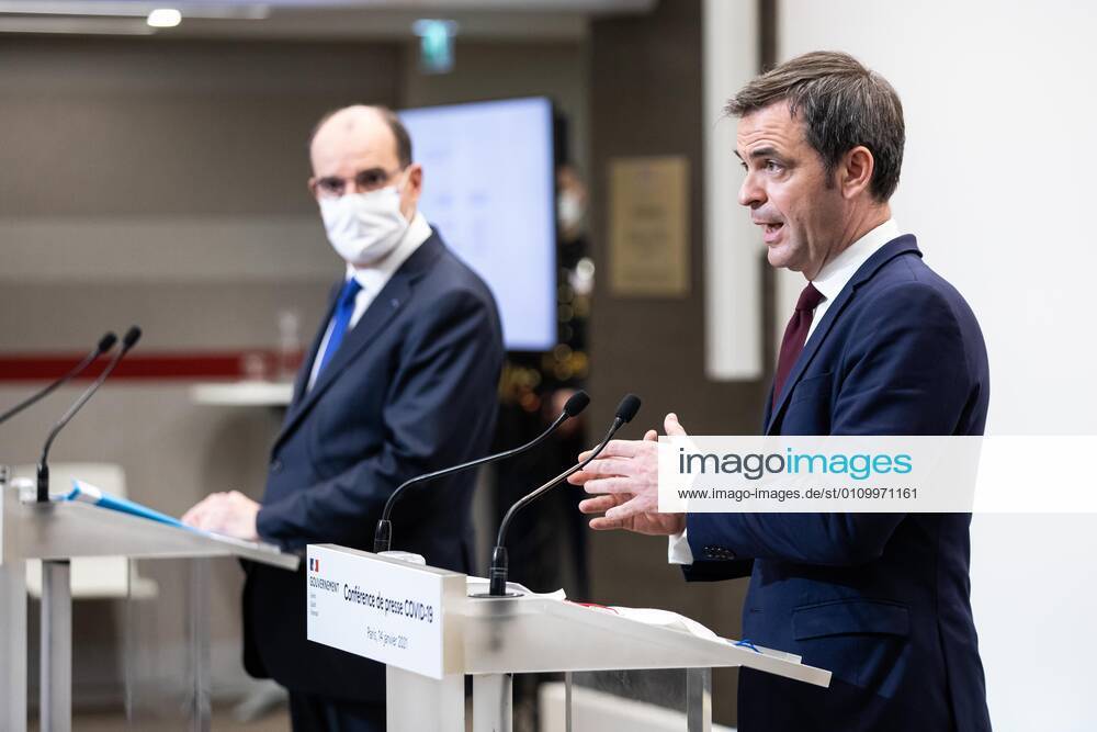 - French Minister for Health Olivier Veran (R) speaks flanked by French Prime Minister Jean Castex during a press conference in Paris on January 14, 2021, on the current French government strategy for the ongoing coronavirus (Covid-19) epidemic.