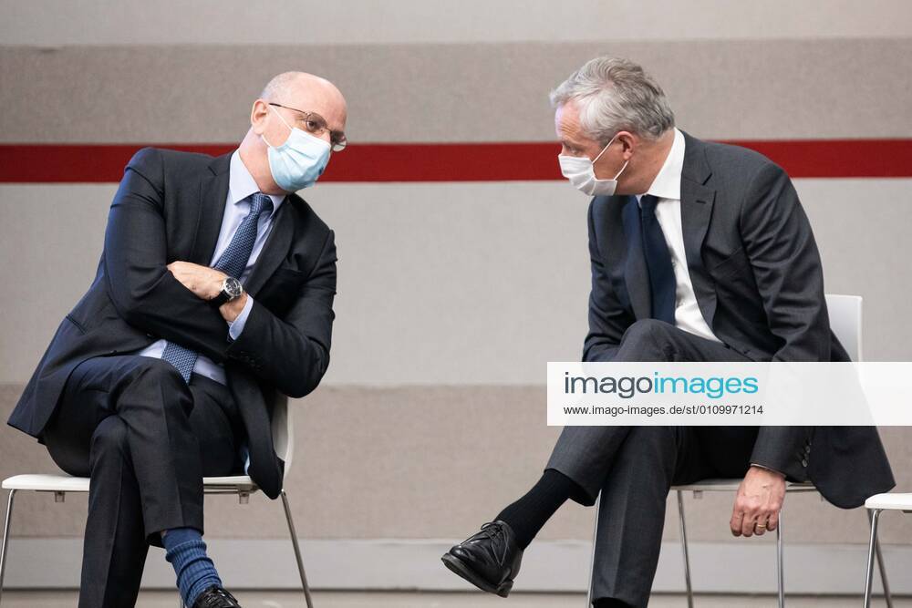 - French Economy and Finance Minister Bruno Le Maire (R) and French Education, Youth and Sports Minister Jean Michel Blanquer talk during a press conference in Paris on January 14, 2021, on the current French government strategy for the ongoing coronavirus (Covid-19) epidemic.