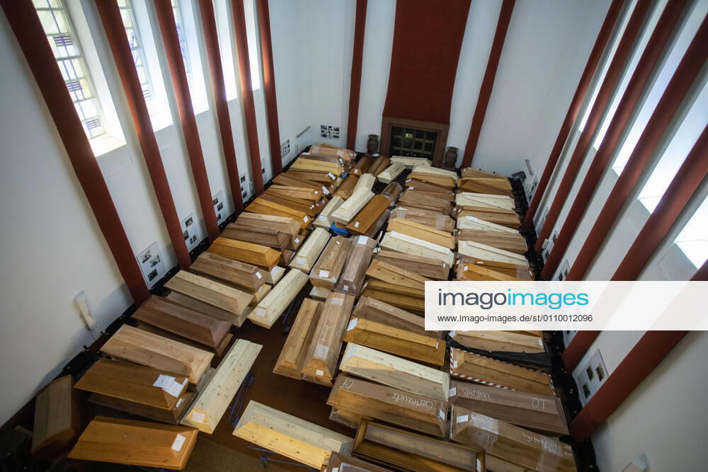 Germany, Saxony, Städtisches Bestattungswesen Meißen GmbH, crematorium, coffins piled up by Corona in the festival hall