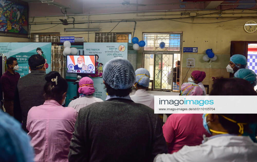 Nurses listen to Prime Minister Narendra Modi speech on television about the lauch of Covishield Coronavirus vaccine developed by Oxford University and AstraZeneca Plc and Produced by Serum Institute Of India at the M.R. Bangur Hospital..India started its First Phase of Coronavirus (Covid-19) vaccination today. Kolkata India - ZUMAs197 20210116_zaa_s197_013