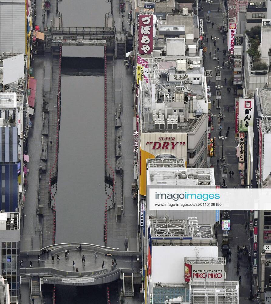 Osaka Pref. under coronavirus state of emergency Photo taken Jan. 16, 2021, from a Kyodo News helicopter shows far fewer pedestrians than usual in Osaka s Minami area on the first weekend after Osaka Prefecture was added to a list of places under a coronavirus state of emergency.