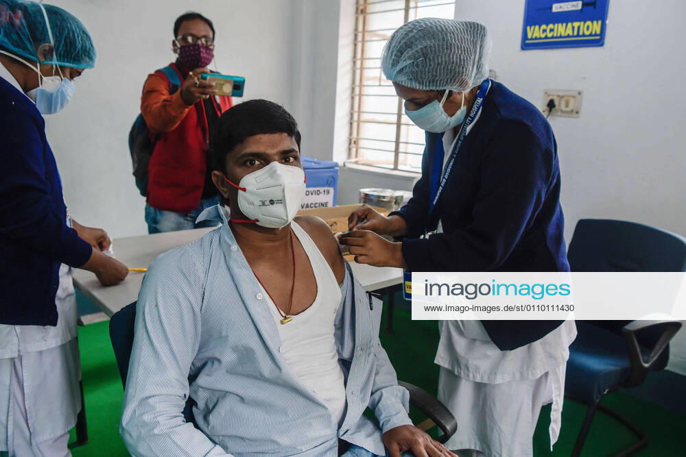 A nurse vaccinate a frontline health worker with Covishield Coronavirus vaccine developed by Oxford University and AstraZeneca Plc and Produced by Serum Institute Of India, at the Baruipur Sub Divisional & Super Speciality Hospital. After a year since the coronavirus pandemic began, claiming over 150.000 lives in India, Prime Minister Narendra Modi launched a nationwide vaccination drive against Covid-19, today. Kolkata India - ZUMAs197 20210116_zaa_s197_046