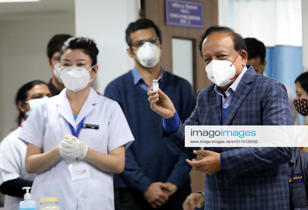 Indian Union Health Minister Dr. Harsh Vardharn holds a vial of the Covid-19 vaccine..The nationwide Covid-19 vaccination program began today in India. Frontline health workers are the first group of people to be vaccinated. New Delhi India - ZUMAs197 20210116_zaa_s197_102