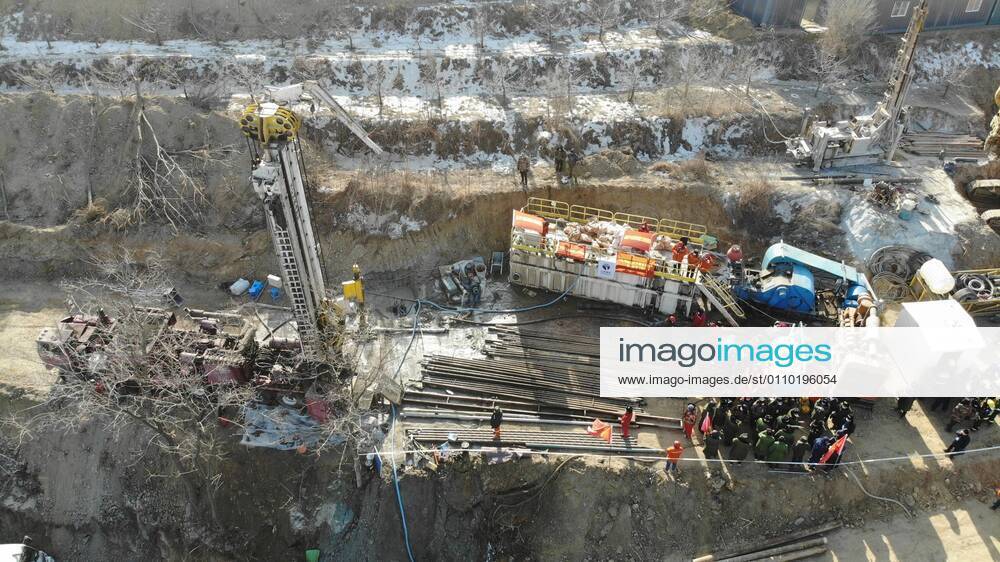 (210117) -- QIXIA, Jan. 17, 2021 -- Aerial photo taken on Jan. 17, 2021 shows rescuers drilling a hole at the explosion site of a gold mine in Qixia City, east China s Shandong Province. Twenty-two workers have been trapped underground after an explosion ripped through the gold mine that was under construction in east China s Shandong Province. Rescuers have drilled a hole from the ground to the tunnel where the trapped workers are located. ) CHINA-SHANDONG-QIXIA-GOLD MINE-RESCUE (CN) WangxKai