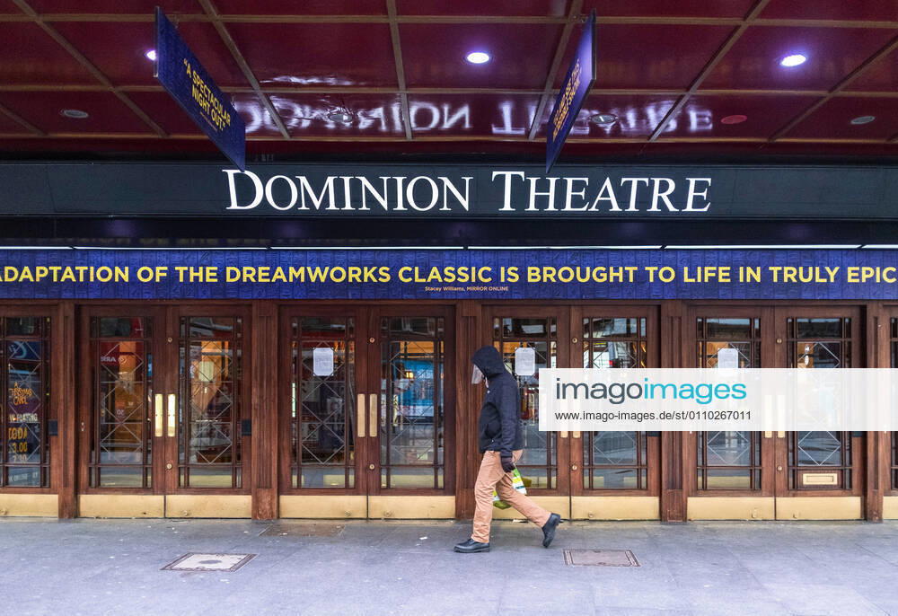 A man wearing a face mask passing Dominion Theatre in London. Latest Covid-19 lockdown slams UK business owners. London United Kingdom - ZUMAs197 20210117_zaa_s197_136